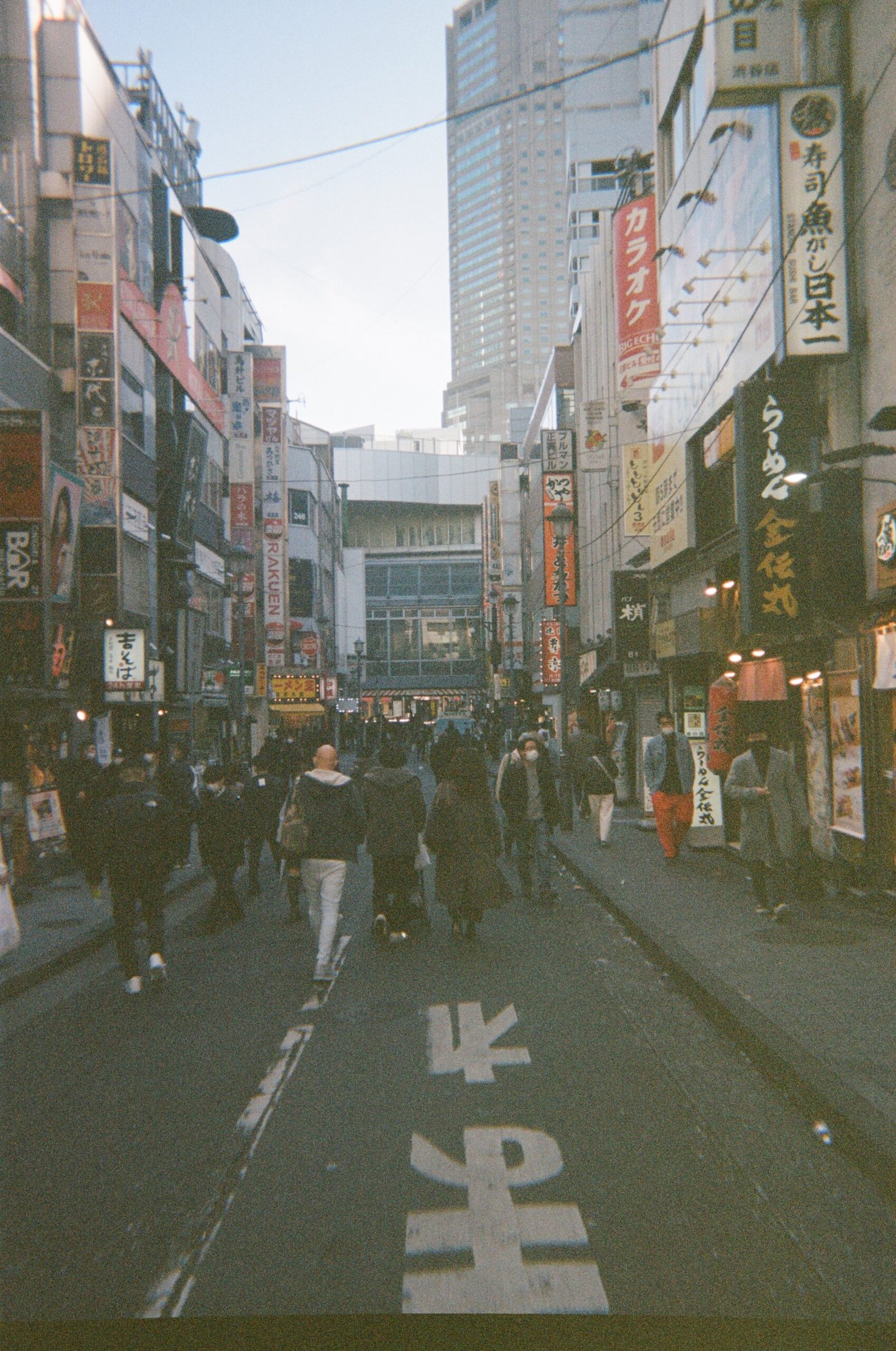 An afternoon stroll through Tokyo featuring an array of characters each on their own journeys.
